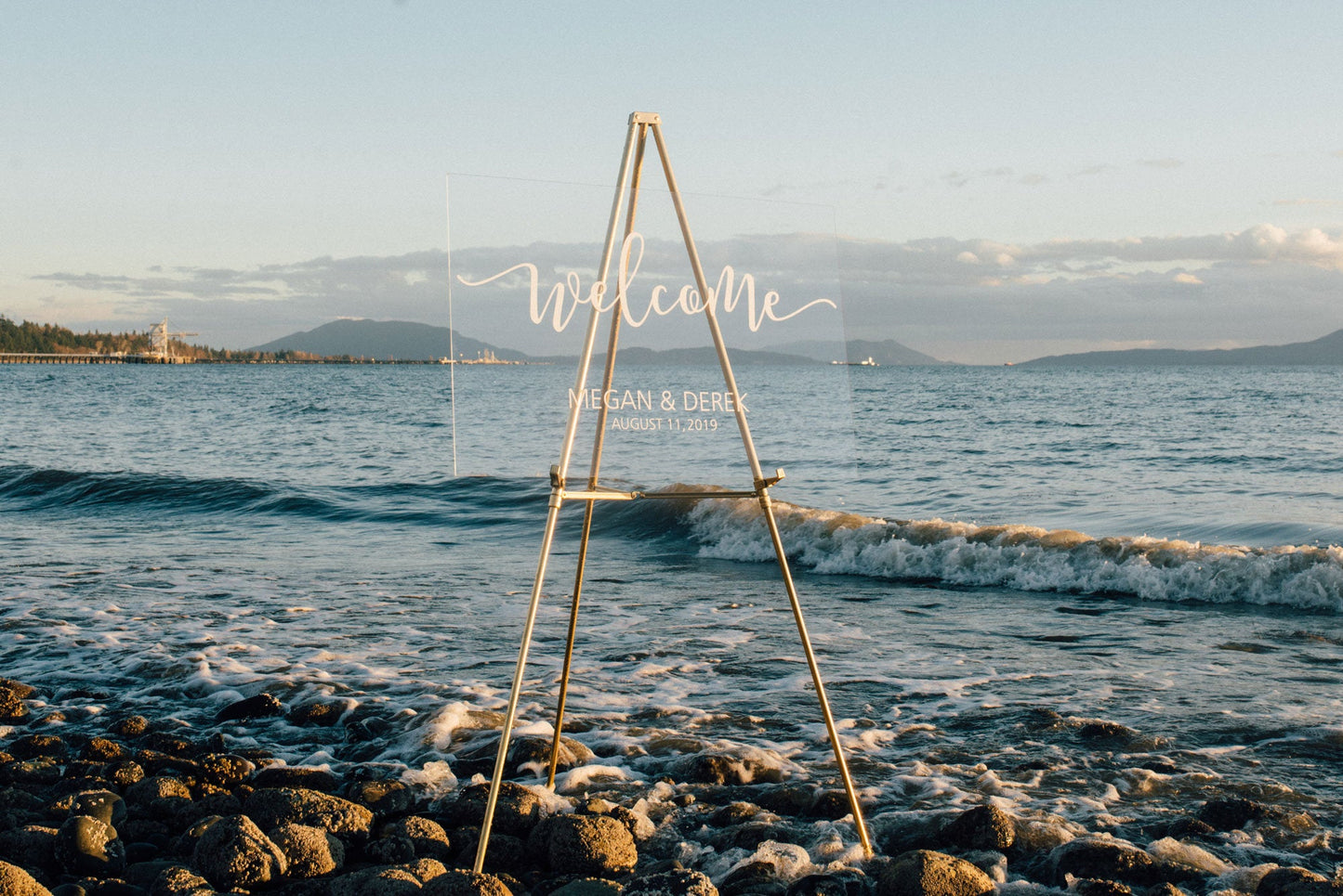 Acrylic wedding welcome sign with vinyl decal at a beach style wedding  