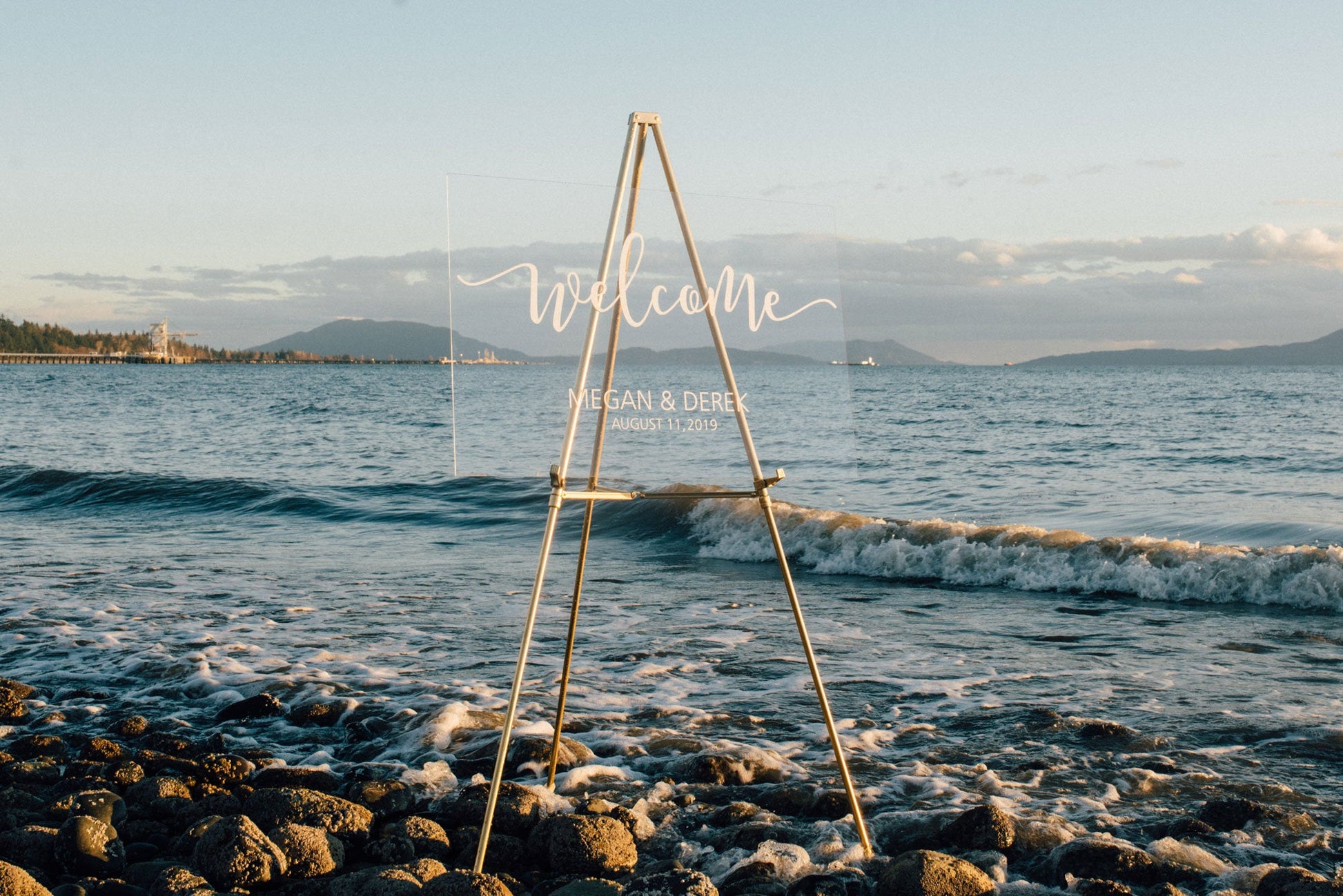Acrylic wedding welcome sign with vinyl decal at a beach style wedding  