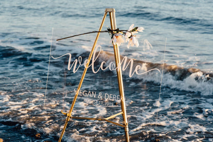 Acrylic wedding welcome sign with vinyl decal at a beach style wedding  