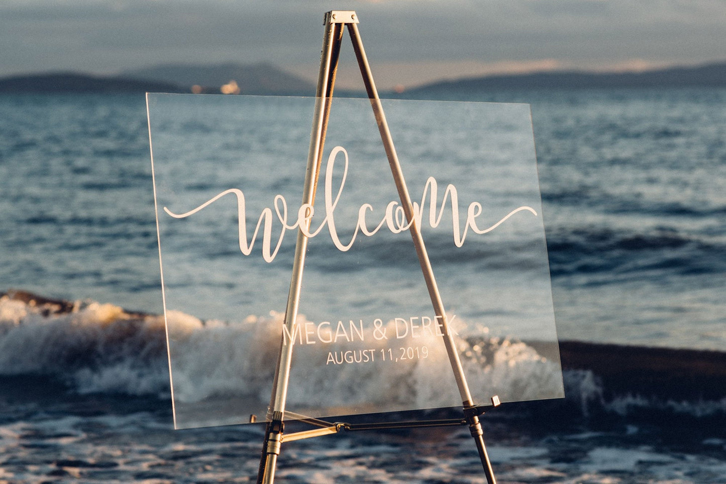 Acrylic wedding welcome sign with vinyl decal at a beach style wedding  