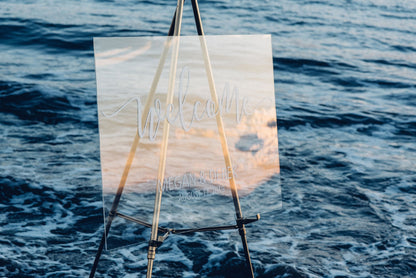Acrylic wedding welcome sign with vinyl decal at a beach style wedding  